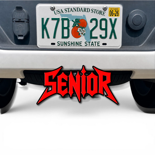 Red and black SENIOR 3D hitch cover car badge mounted on rear vehicle exterior with bold custom lettering