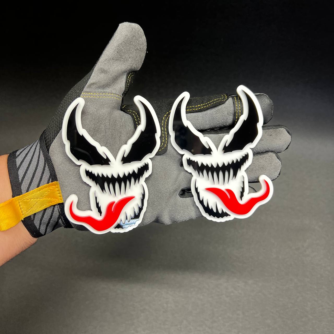 aggressive monster tongue badge on Ford F150 Raptor truck custom build