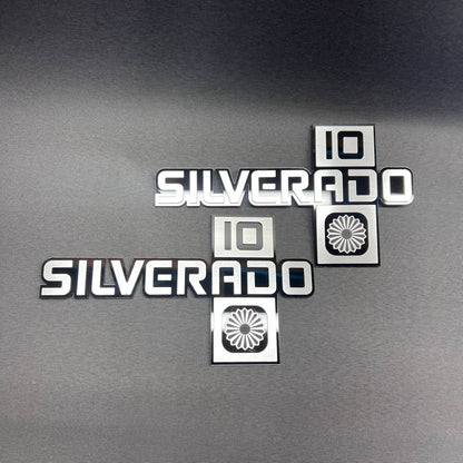 Metallic Silverado 10 truck emblem with raised lettering