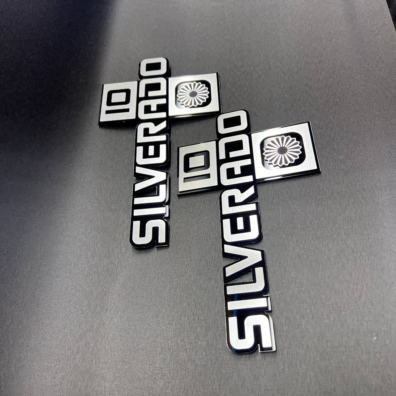 Chevy truck Silverado 10 badge with decorative lower symbol