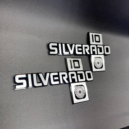 Chevy truck Silverado 10 badge with decorative lower symbol