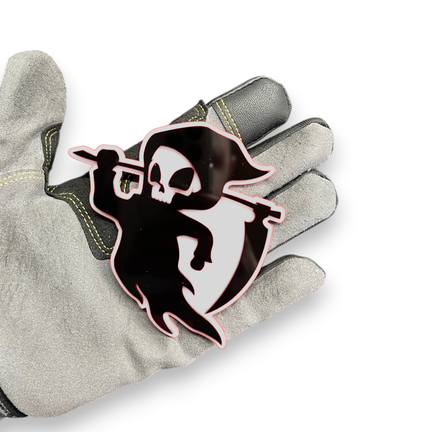 Reaper badge shown as custom vehicle fender emblem with hooded skull design
