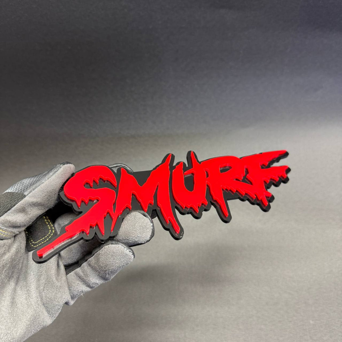 SMURF graffiti-style custom fender badge featuring aggressive drip typography, red lettering and black backing for Ford Mustang, F150 and Bronco.