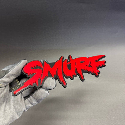 SMURF graffiti-style custom fender badge featuring aggressive drip typography, red lettering and black backing for Ford Mustang, F150 and Bronco.