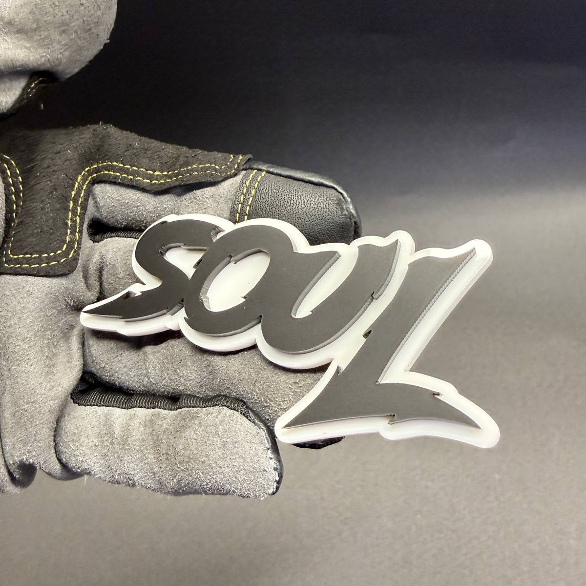 SOUL automotive script emblem with layered black and white design, decorative aftermarket badge for Ford Mustang, F150 and Bronco.