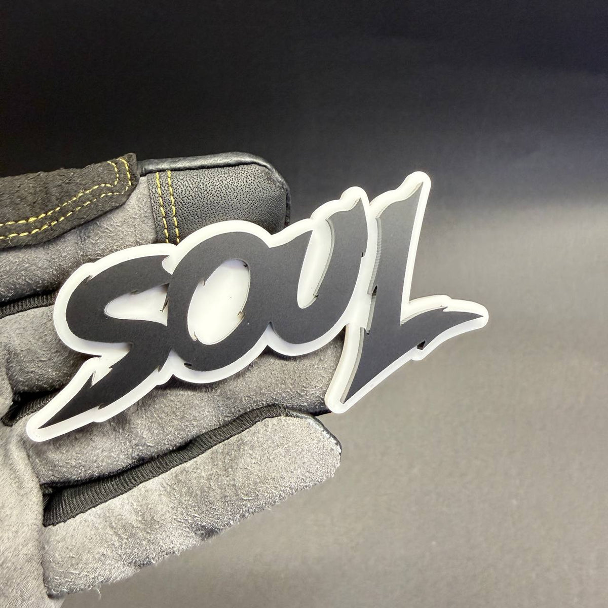 SOUL black and white double-layer acrylic car badge with bold script typography, custom automotive styling for Chevrolet Camaro and Silverado.