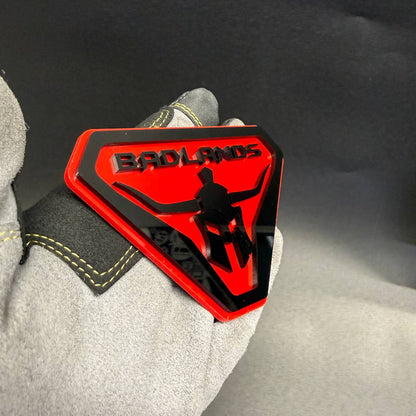 Badlands Gladiator custom fender emblem with warrior helmet design for automotive exterior.