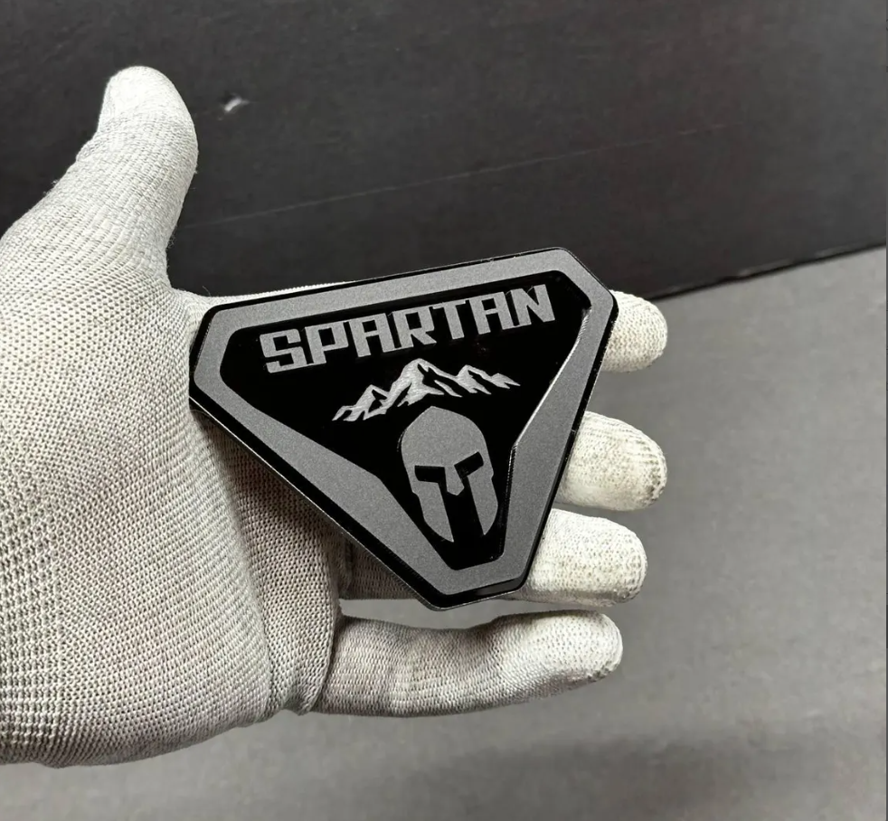 Custom black and silver Spartan emblem badge for Ford Bronco off-road customization