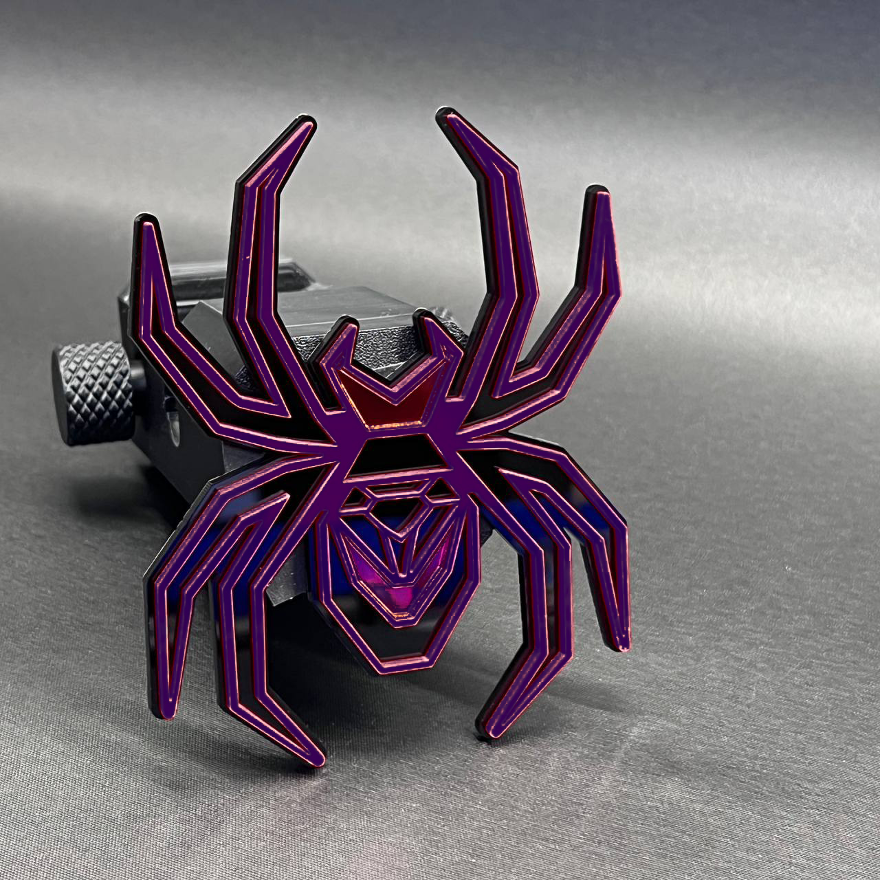 Custom Black Widow mirror finish hitch cover emblem for trucks and SUVs.