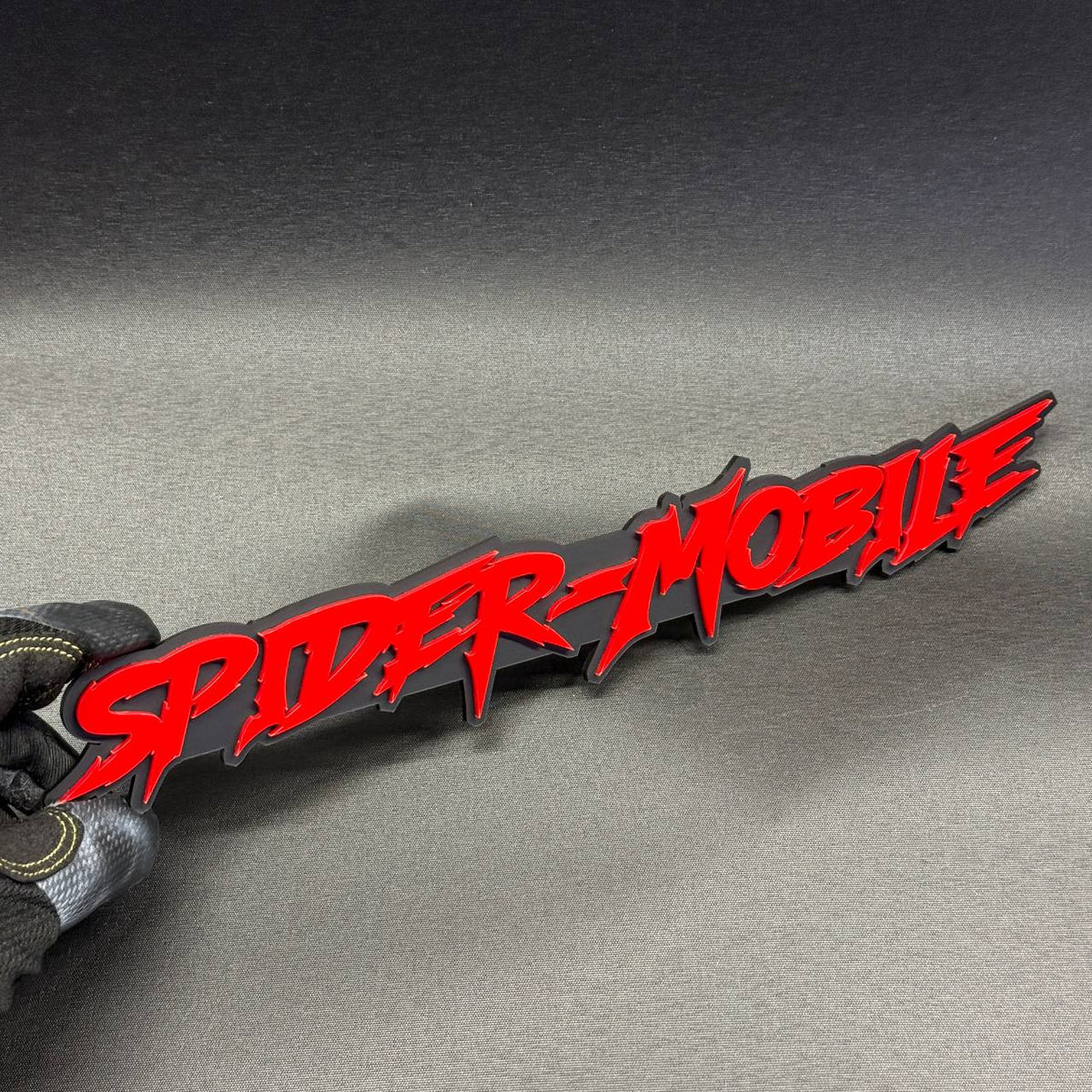 Red SPIDER-MOBILE automotive emblem for Chevy Silverado, GMC Sierra and custom trucks
