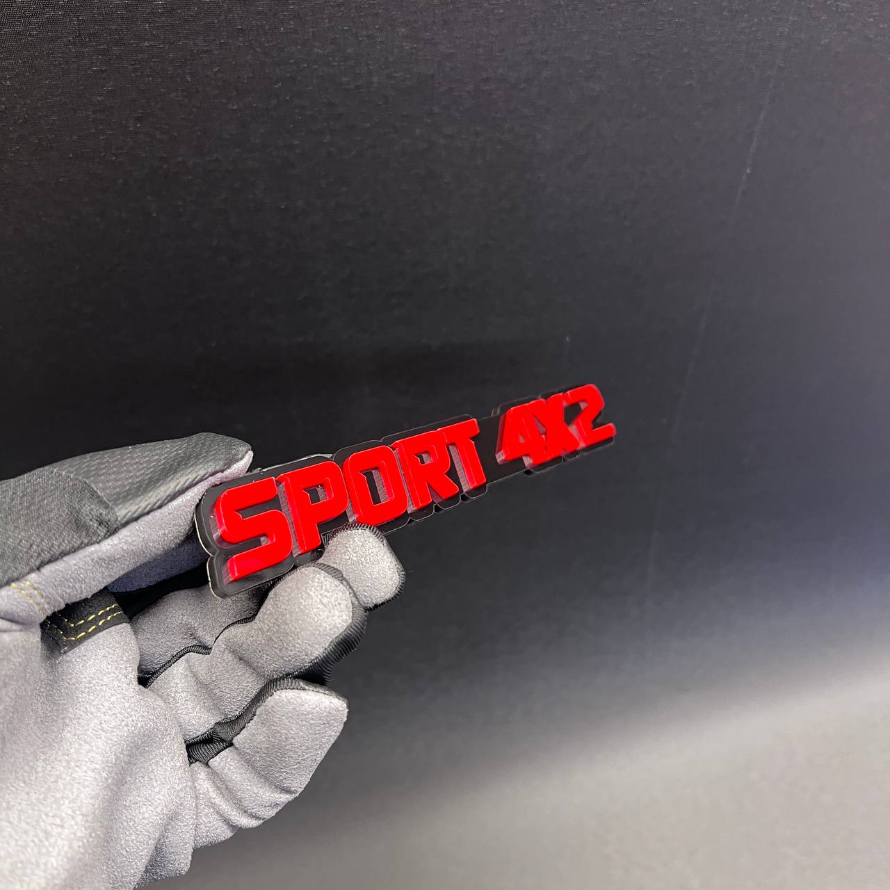 Custom SPORT 4x2 automotive badge designed for truck and SUV exterior decoration.