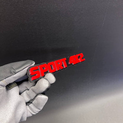 Custom SPORT 4x2 automotive badge designed for truck and SUV exterior decoration.