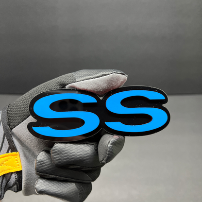 Decorative SS car emblem with precision laser-cut acrylic construction.