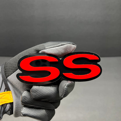 Red and black SS custom acrylic car badge for vehicle exterior.