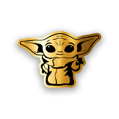 Star Wars inspired car emblem featuring a Grogu style engraved character design
