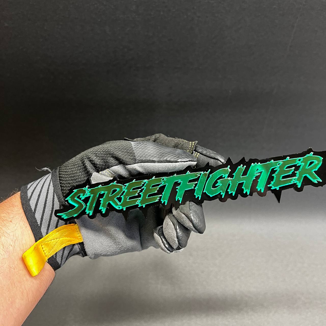 Street Fighter performance style car badge emblem made from layered acrylic with aggressive drift inspired lettering design