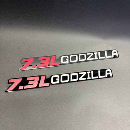 Custom 7.3L Godzilla fender emblem for Ford F250 Super Duty trucks with red and silver lettering.