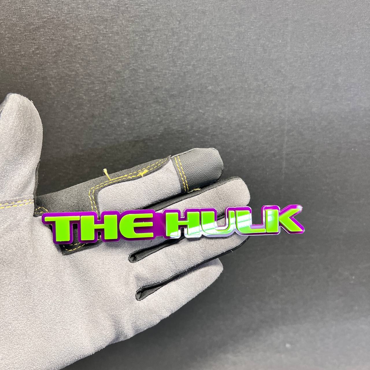 Handmade The Hulk 3D exterior car badge displayed on a work glove