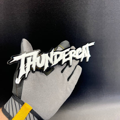 Custom THUNDERCAT vehicle emblem with sharp white lettering