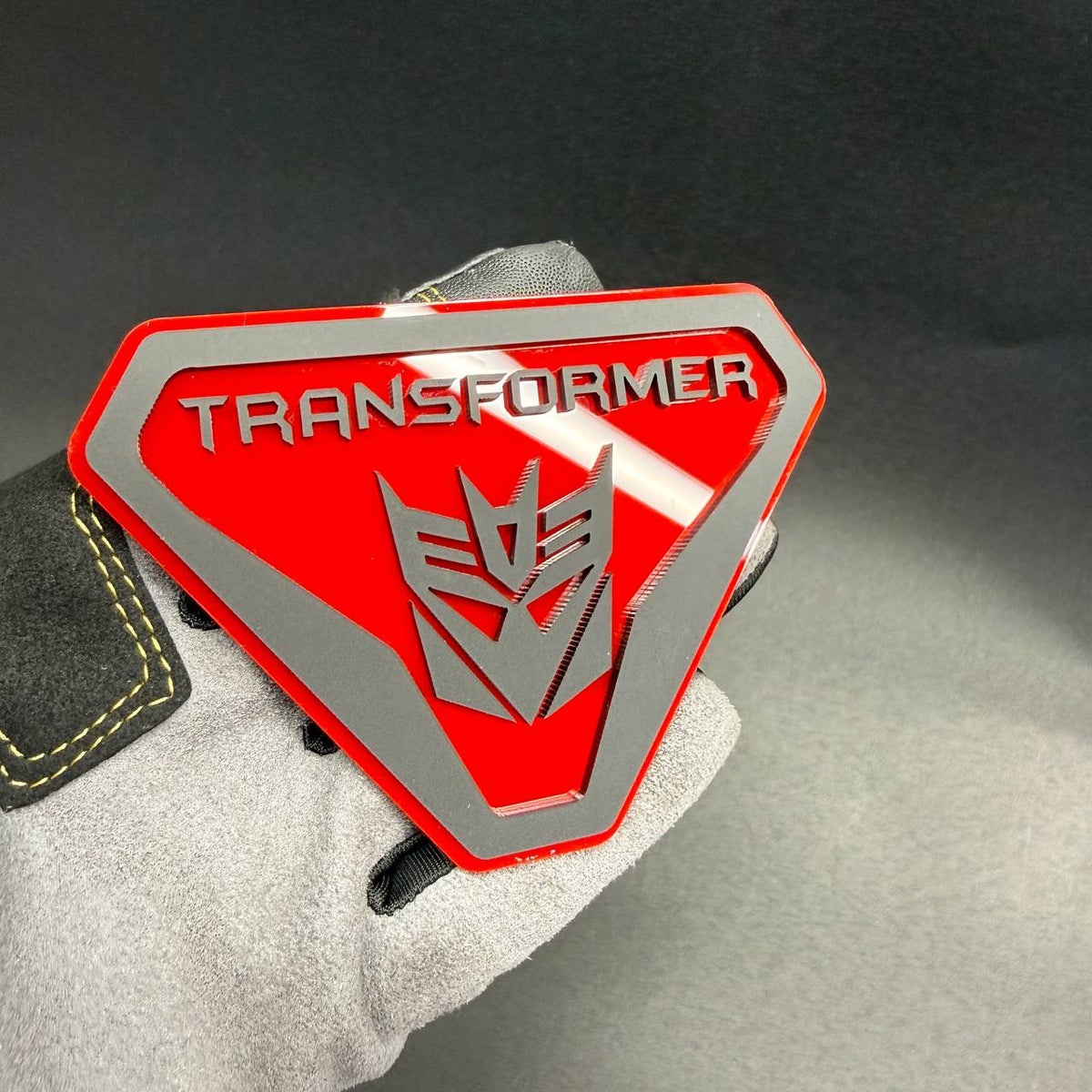 Transformer Decepticon Badlands 4x4 badge with red and silver shield design for off-road trucks and SUV exterior decoration.