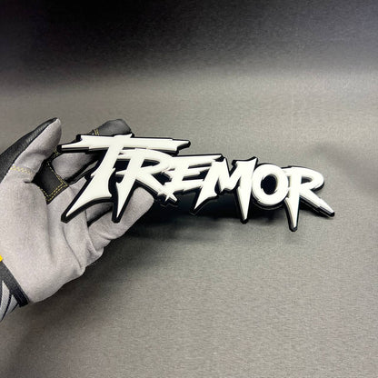 White and black TREMOR vehicle emblem custom exterior badge