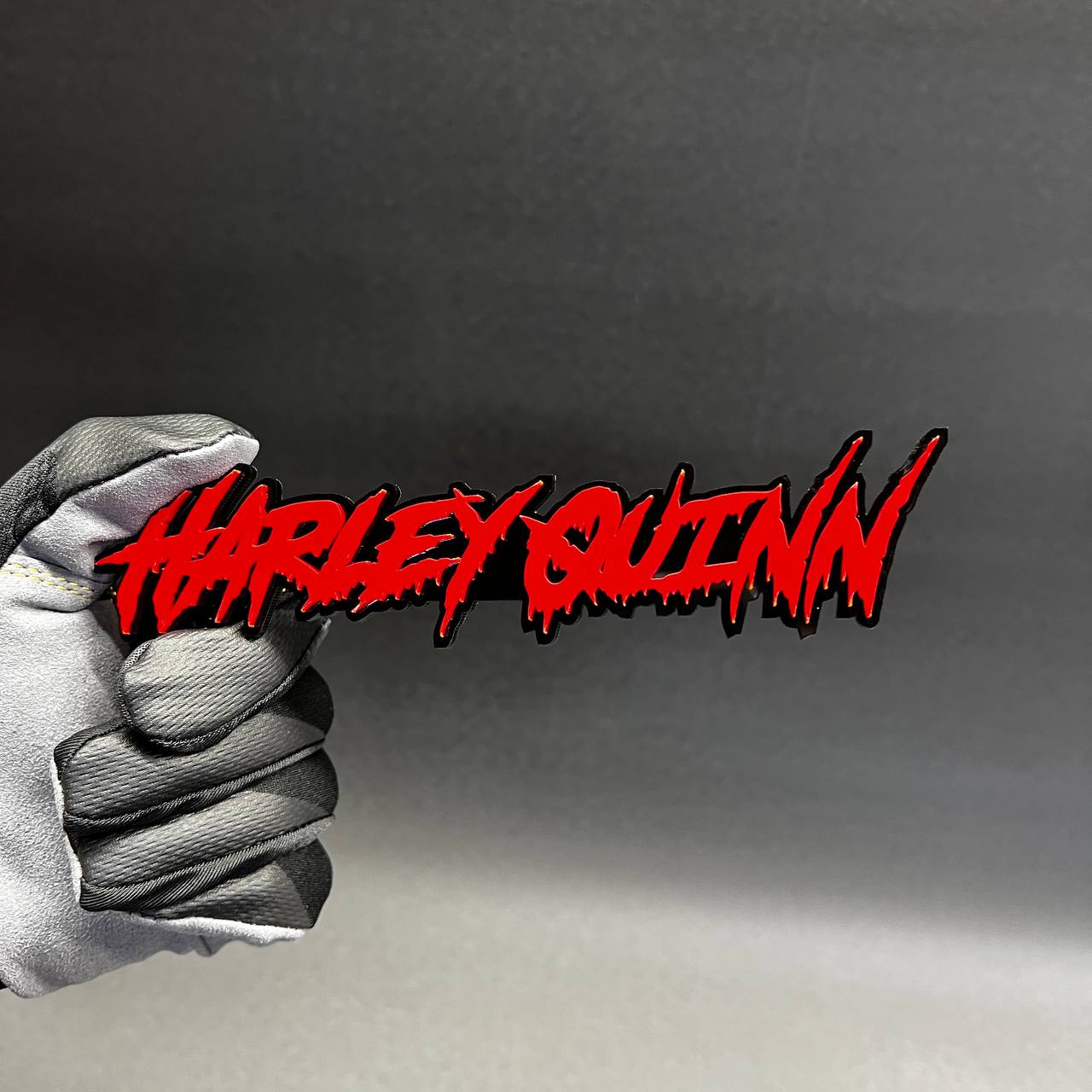 Premium custom automotive badge with dripping font design