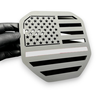 USA flag red line emblem on Chevy Silverado custom truck build offroad