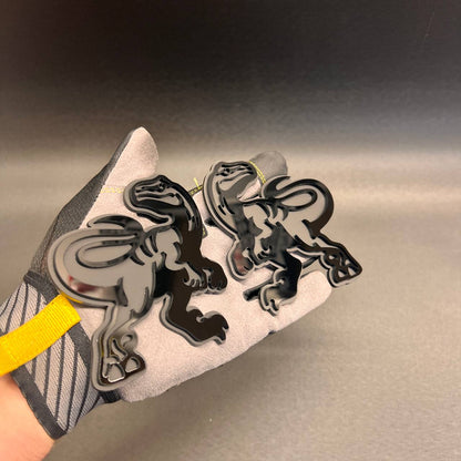 Dinosaur Raptor car and truck emblem with layered black and silver finish
