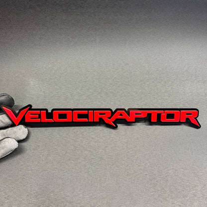 Red and black Velociraptor car emblem badge for Ford, Toyota, GMC, Chevy, Jeep and RAM vehicles