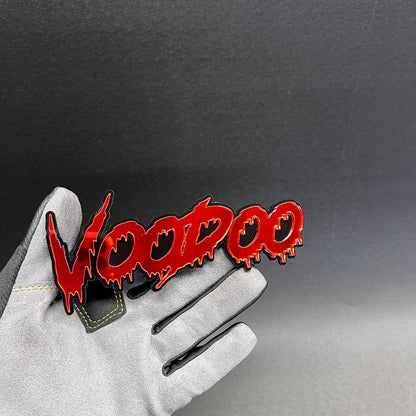 Custom VOODOO car badge fender emblem in glossy red with a black background