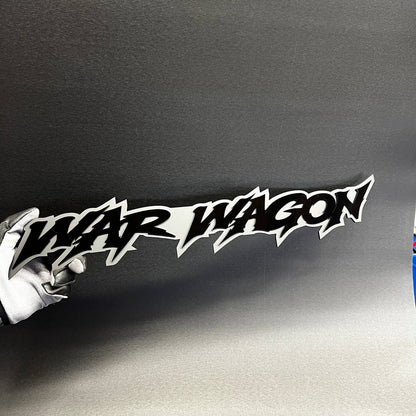 War Wagon black and white layered acrylic emblem with sharp aggressive lettering for custom vehicle styling.