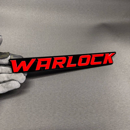 Red WARLOCK automotive badge with black backing for RAM 1500 2500 3500 truck customization