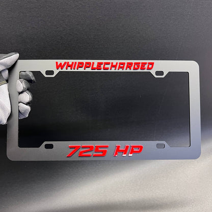 Whipplecharged 725 HP car license plate frame with red raised lettering and black finish.