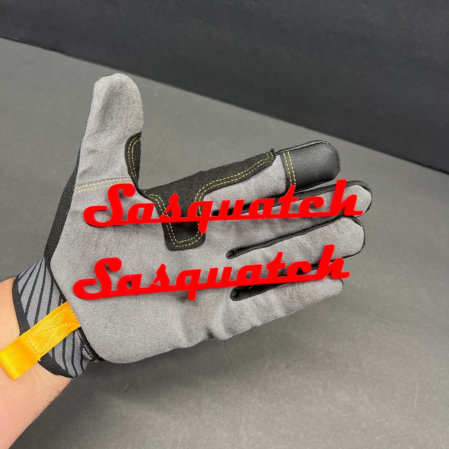 White and black personalized script emblem for automotive exterior styling