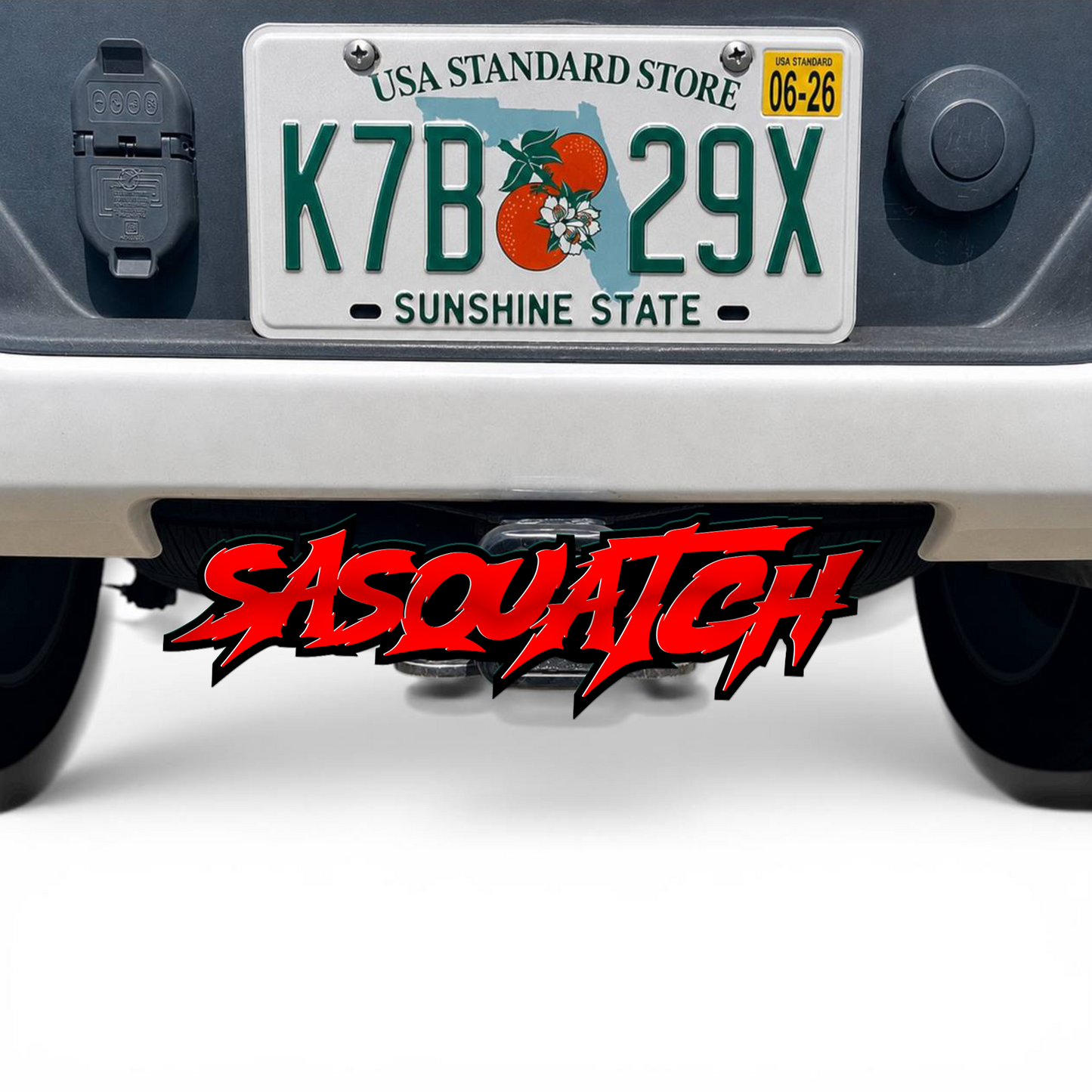 Custom sasquatch hitch cover for pickup truck rear receiver with wilderness inspired design