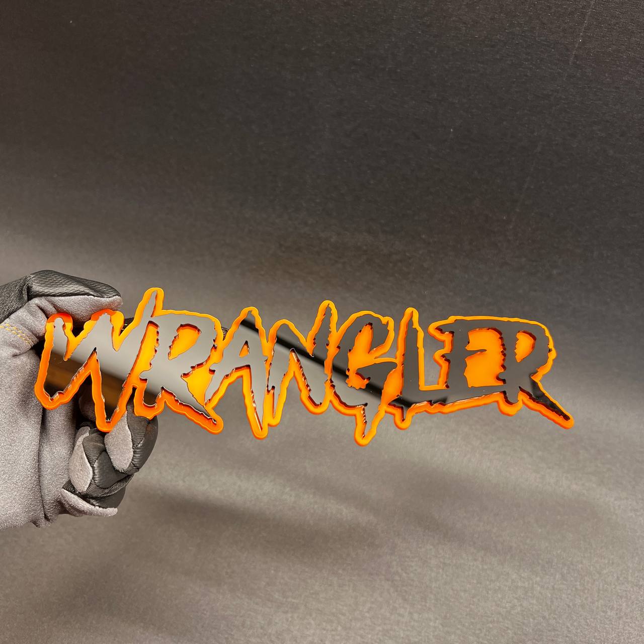 Custom Wrangler name badge for truck, SUV, or Jeep exterior styling.