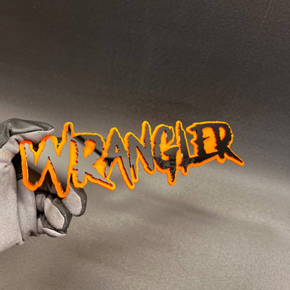Personalized Wrangler vehicle emblem for custom car and truck builds.