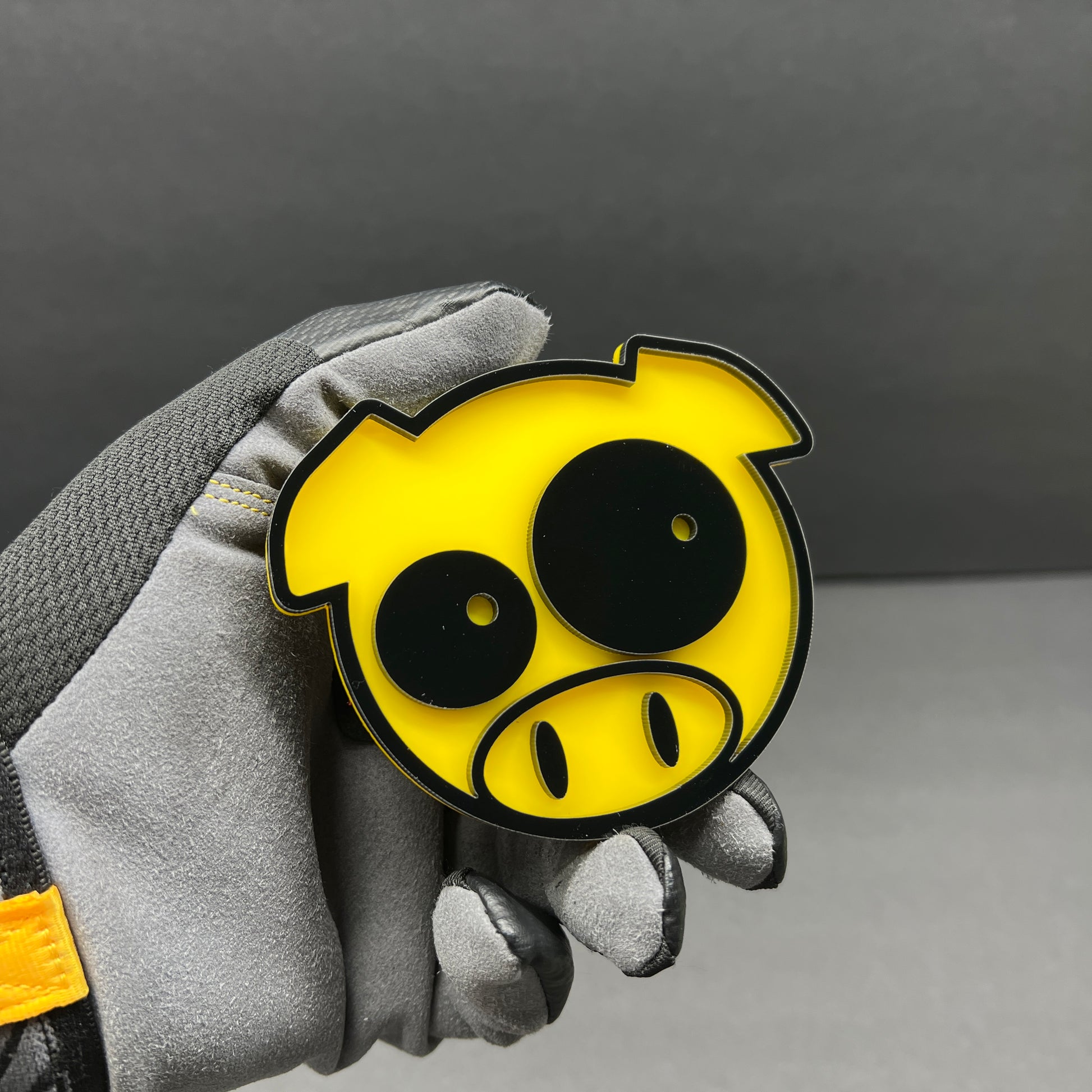 Pig car emblem with adhesive backing for fender, tailgate, or grille placement